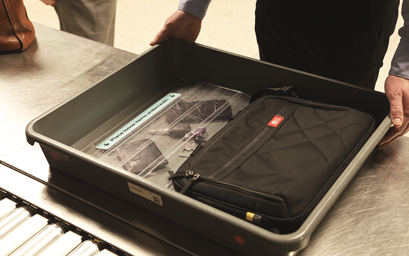 Items on a tray at security screening